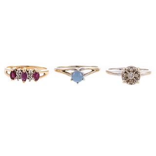 A Trio of Gemstone & Diamond Rings in Gold