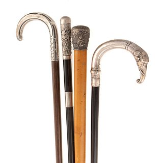 Four Silver-Mounted Walking Sticks