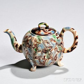 Staffordshire Tortoiseshell-glazed Creamware Teapot and Cover
