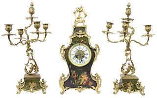 Set of French Gilt Bronze Clock and Candelabras