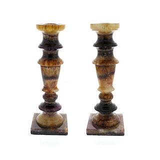 A pair of Blue John candlesticksAssorted veins including Winnats One Each with moulded flat-rimmed s
