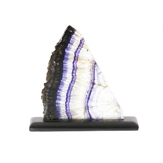 A Blue John sliceMillers Vein Of triangular 'shark fin' form with attractive radial 'tree ring' vein