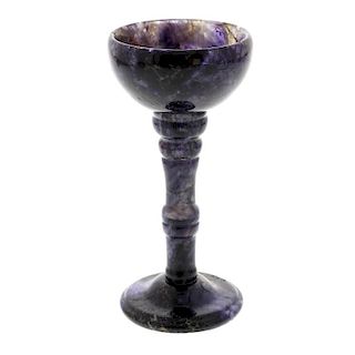 A Blue John pedestal cup The hemispherical bowl shading from dark violet to pale lilac with some mar
