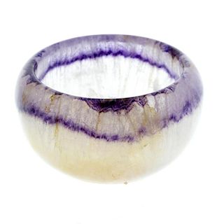 A small Blue John bowl. Of hemispherical form with parallel rim banding, 40mm diameter x 22mm high,