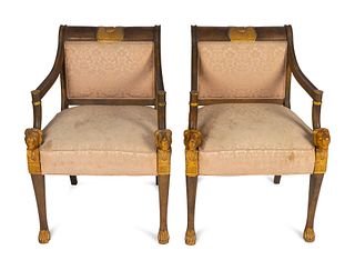 A Pair of Egyptian Revival Parcel-Gilt Mahogany Armchairs
Height 33 1/2 x width 24 x depth 18 1/2 inches.
