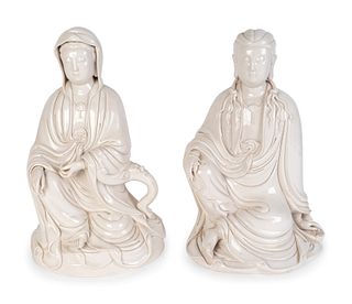 Two Chinese Blanc de Chine Porcelain Figures of Guanyin
Heights 13 and 14 inches, widths 9 and 10 inches.