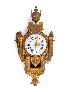 A Louis XVI Style Gilt-Bronze Cartel Clock
Height 32 x width 17 1/2 x depth 3 3/4 inches.