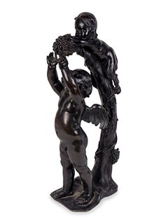 A Continental Patinated Bronze Group of Cupid and an Infant Satyr
Height 21 x length 8 x width 6 inches.