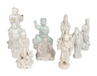 Nine Chinese Blanc de Chine Porcelain Figures of Buddha, Confucius, Sages and Dignitaries
Heights 5 2/4 to 13 ½ inches.