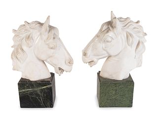 A Pair of Continental Carved Marble Horse Heads
Height of head 8 x length 8 x width 3 inches; height of base 3 3/4 x 4 1/4 x 3 1/4 inches.