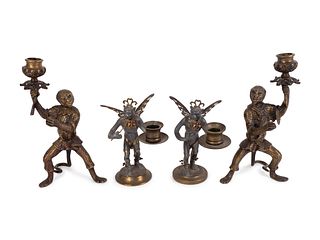 Two Pair of Bronze Monkey-Form Candlesticks
Heights 8 1/2 and 5 1/2 inches.
