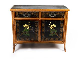 A Victorian Bamboo and Lacquer Cabinet
Height 32 x length 39 x depth 16 inches.