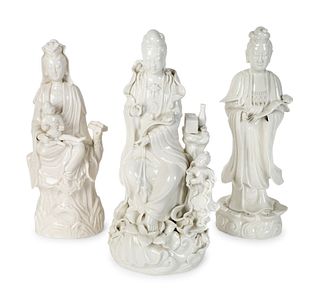 Three Chinese Blanc de Chine Porcelain Figures of Guanyin
Heights 16, 17 and 17 ¼ inches.