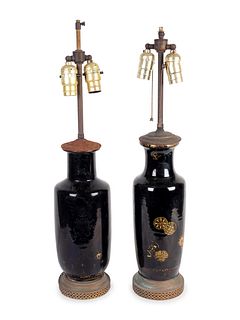 Two Chinese Gilt-Decorated Black-Glazed Porcelain Vases Mounted as Lamps
Heights excluding fittings 16 inches.