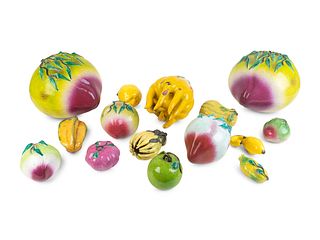 A Large Group of Chinese Polychromed Ceramic Fruit
Length of largest 10 inches.