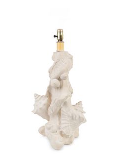 A Contemporary Plaster Shell-Form Lamp
Height 19 x width 12 inches.