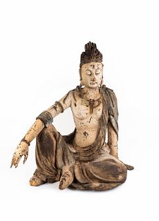 A Chinese Polychromed Figure of Guanyin
Height 32 x width 30 x depth 19 inches.