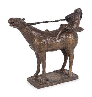 A Patinated Bronze Figure of a Horse and Rider
Height 11 1/4 x length 15 x width 4 inches.