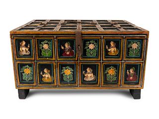 An Indian Polychromed Wood Coffer
Height 8 1/4 x width 15 3/4 x depth 12 1/2 inches.