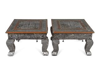 A Pair of Indian Silvered Metal-Sheathed Footstools
Height 9 1/2 x width 14 x depth 14 inches.