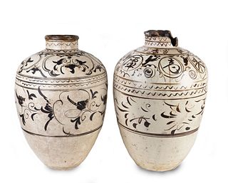 A Large Pair of Chinese T'zu Chou Style Storage Jars
Height 25 and 27 1/2 inches; diameter 17 inches.