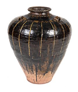 A Large Chinese Brown-Glazed Pottery Urn
Height25 x diameter 22 inches.