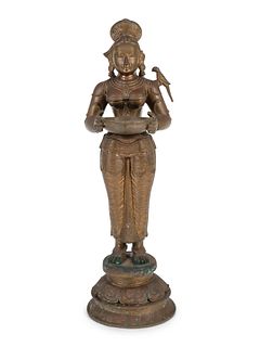 An Indian Bronze Figure
Height 23 1/2 x width 8 x depth 8 inches.