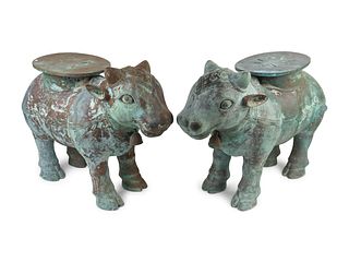 A Pair of Indian Sacred Cow-Form Metal Garden Seats
Height 19 x length 26 x width 10 inches.