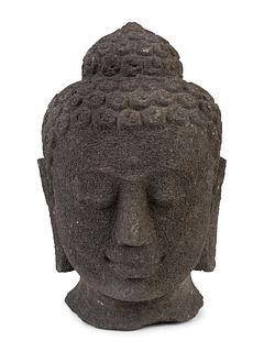 An Indonesian Volcanic Head of a Deity
Height 16 x width 10 x depth 10 inches.