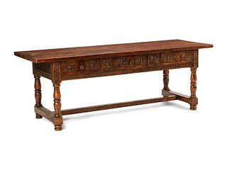 An Italian Baroque Style Walnut Table
Height 29 x width 82 x depth 27 1/2 inches.