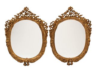 A Pair of Italian Rococo Style Gilded Mirrors
Height 49 x width 35 1/2 inches.