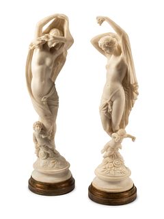 A Pair of Italian Marble Figures of Ladies with Cherubs
Height 41 1/2 inches.