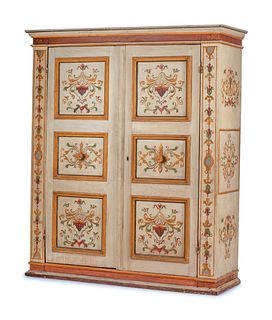 An Italian Neoclassical Painted Armoire
Height 90 x width 75 x depth 25 1/2 inches.