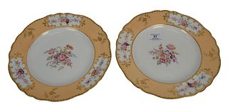 Group of Sixteen Scalloped Edge English China, to include twelve dinner plates; along with four serving plates, each marked to the underside with "Die