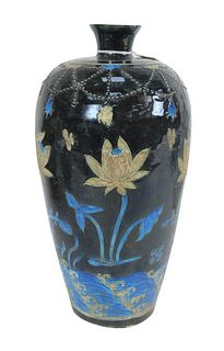 Chinese Fahua Mei Ping Vase having raised flowers and butterflies over waves, 19th century, height 13 1/2 inches.