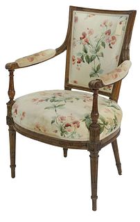 Louis XVI Fauteuil with molded rectangle back and rounded seat set on fluted legs, 18th century, old repairs to back, height 35 inches, width 22 inche