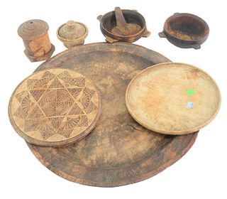 Eight Piece Group of Woodware to include a large burlwood treenware charger or serving plate, diameter 20 1/2 inches, small serving ladle, an American