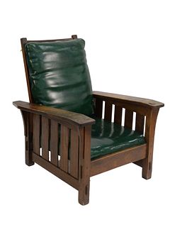 Gustav Stickley Oak Morris Chair, having bent or drop arms with five slats, #369, with green vinyl cushions, height 39 inches, width 32 1/2 inches.