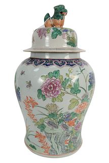 Large Chinese Porcelain Jar in baluster form having domed cover with foo lion finial over painted chrysanthemums and peonies and seal mark on bottom, 