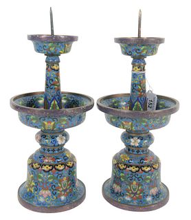 Pair of Chinese Cloisonne Pricket Candle Holders each having two inverted drip pans with wild flower and scrolling vine decor, height 12 1/4 inches.