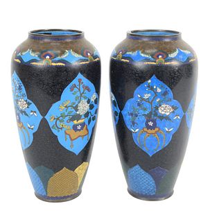 Pair of Chinese Cloisonne Vases, with wide mouth openings, having floral decorations, circa 19th Century or later, height 8 3/4 inches.