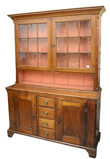 Walnut Two-Part Stepback Cupboard, top with two glazed doors over open shelf on lower section with four drawers and two doors, all set on bracket feet