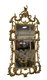 Carved and Gilt Chippendale Two Part Mirror, with phoenix bird top and overall open work (some repairs), height 72 inches, width 35 inches.