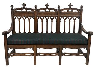 Gothic Style Oak Triple Back Bench, with newly upholstered cushions, height 46 inches, width 64 inches.