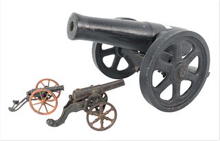Three Iron Civil War Cannons, mid 19th century, two small toy sized along with a larger model for 1 inch balls, length 15 inches, width 11 inches.