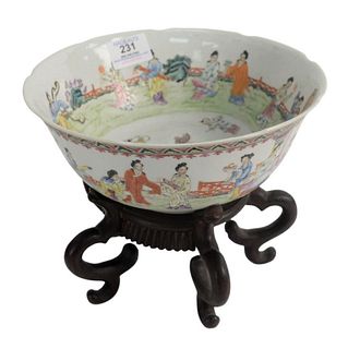 Famille Rose Scalloped Edged Bowl decorated with woman and boys at play outside with custom wood stand, 19th century, spurious Qianlong mark, diameter