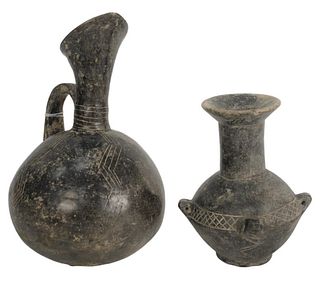 Two Ancient Pottery Vessels, to include grey terracotta jug with globular shape, flared rim and handle, height 5 3/4 inches; along with vase form with