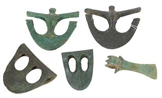 Group of Five Bronze ax heads in geometric and duckbill shapes, B.C. or later, largest 4" x 4 3/4".