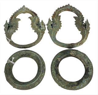 Four Ancient Pieces to include a pair of bronze Khmer anklets, 12th century or later, along with a pair of bronze handles (or anklets), 7 1/4" x 6 1/4
