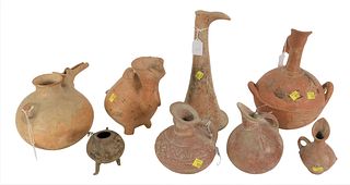 Group of Eight Terracotta Pottery Vessels, to include trumpet form base in form of foot, clear glazed with incised, geometric design and animal head s